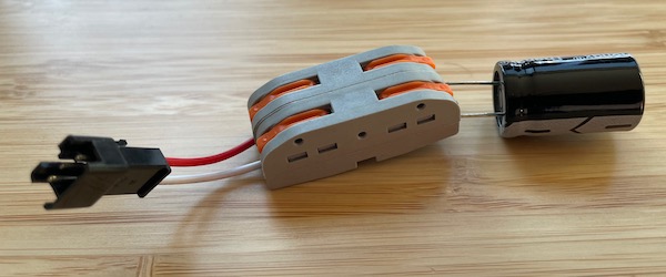 Capacitor Sleeve with Lever